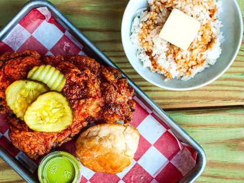 Bantam King Nashville-style fried chicken with pickles, a biscuit, and rice