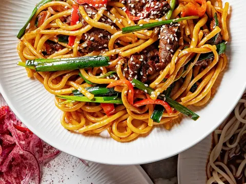 Dolan Uyghur Restaurant Korma Chop noodles with beef, vegetables, and sesame